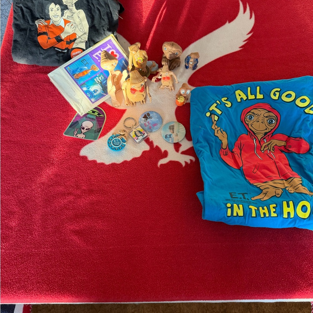 9 E.T. Action Figurines  and two T shirts(M,L)